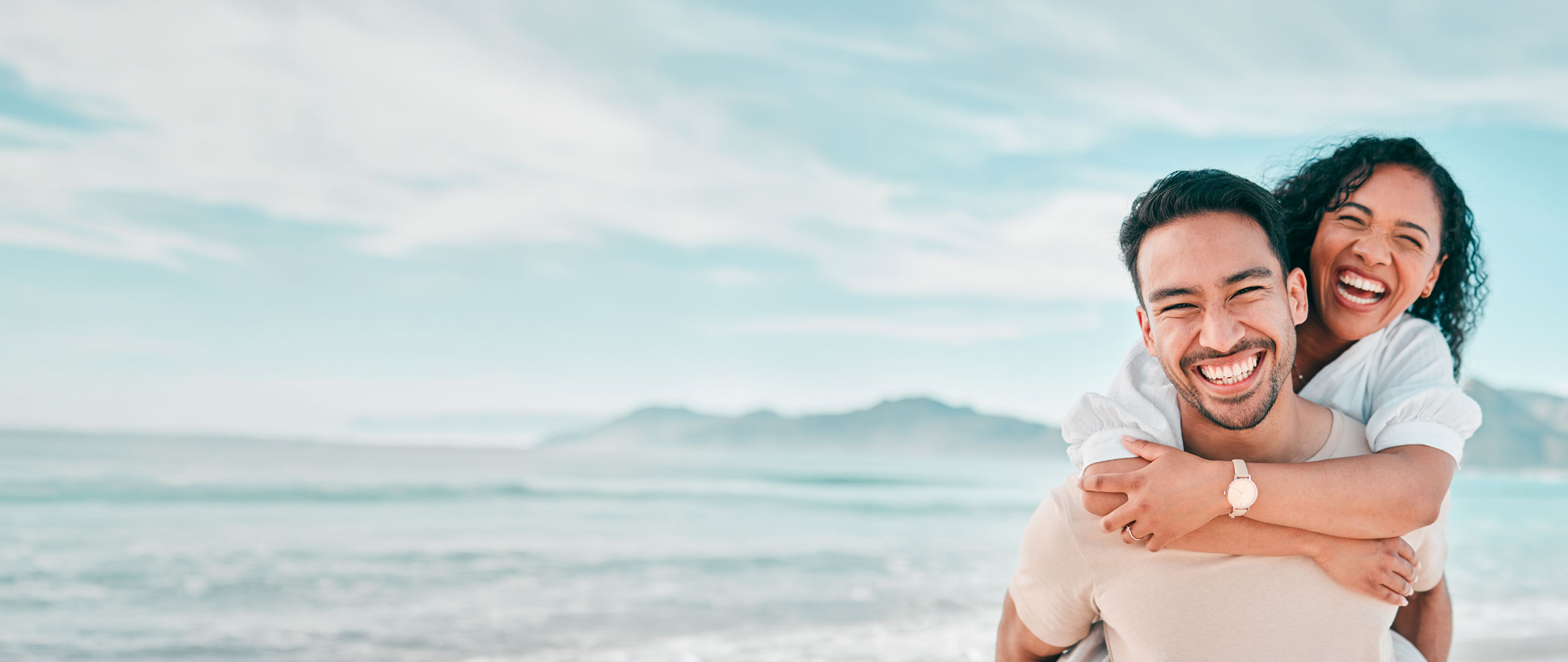 A smiling couple at the beach