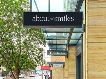 About Smiles Chatswood dental clinic signage on Archer Street